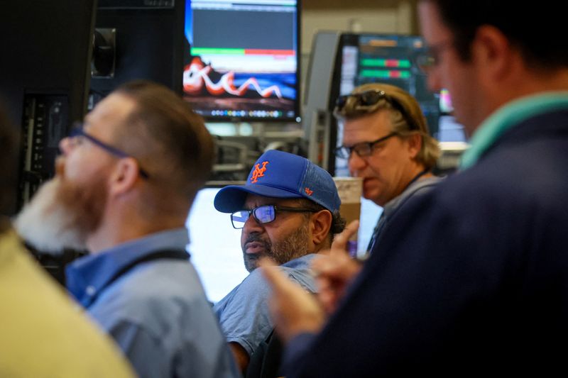 &copy; Reuters. Options floor brokers work on the floor of the NYSE American, formerly known as the American Stock Exchange (AMEX), at New York Stock Exchange (NYSE) in New York City, U.S., July 11, 2023.  REUTERS/Brendan McDermid