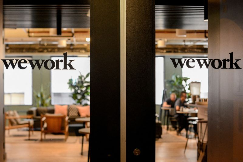 &copy; Reuters. FILE PHOTO: WeWork logos are seen at a WeWork office in San Francisco, California, U.S. September 30, 2019.  REUTERS/Kate Munsch/File Photo
