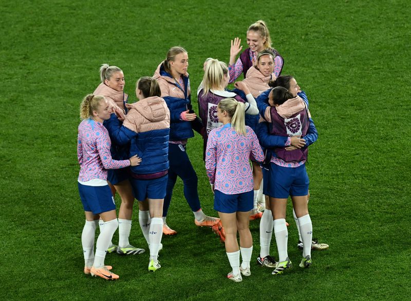 &copy; Reuters. Soccer Football - FIFA Women’s World Cup Australia and New Zealand 2023 - Quarter Final - England v Colombia - Stadium Australia, Sydney, Australia - August 12, 2023 England players celebrate after progressing to the semi finals of the World Cup REUTER