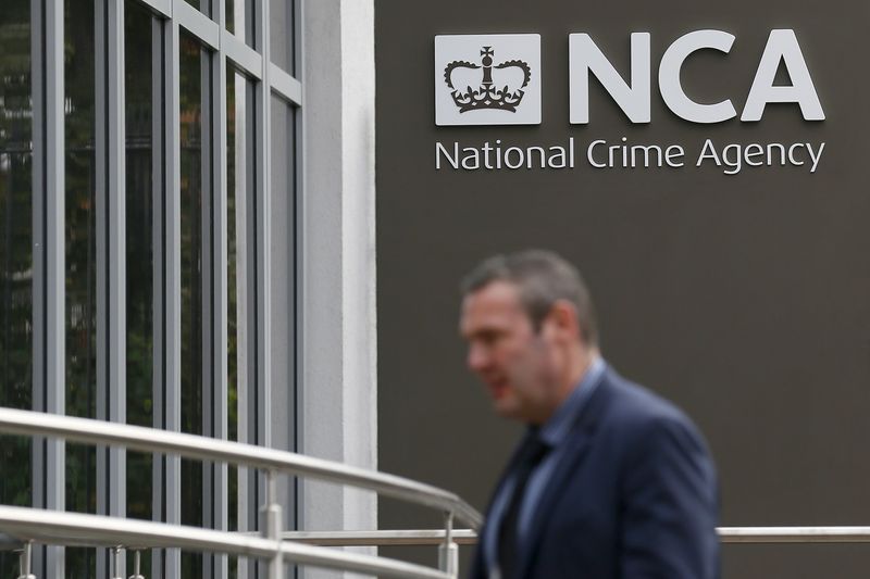 &copy; Reuters. A pedestrian walks past the National Crime Agency (NCA) headquarters in London October 7, 2013. The new body has been launched to pursue organised criminals.   REUTERS/Stefan Wermuth/File Photo