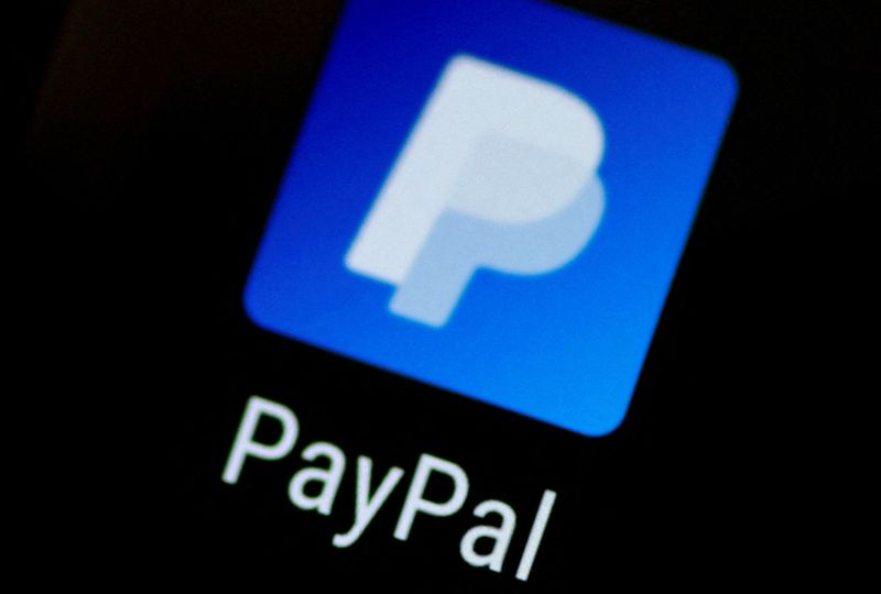 &copy; Reuters. FILE PHOTO: The PayPal app logo seen on a mobile phone in this illustration photo October 16, 2017. REUTERS/Thomas White/File Photo