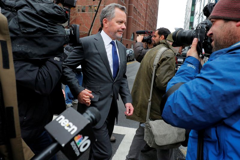 © Reuters. FILE PHOTO: William McGlashan Jr., a former Executive at TPG private equity firm facing charges in a nationwide college admissions cheating scheme, leaves the federal courthouse in Boston, Massachusetts, U.S., March 29, 2019.   REUTERS/Brian Snyder
