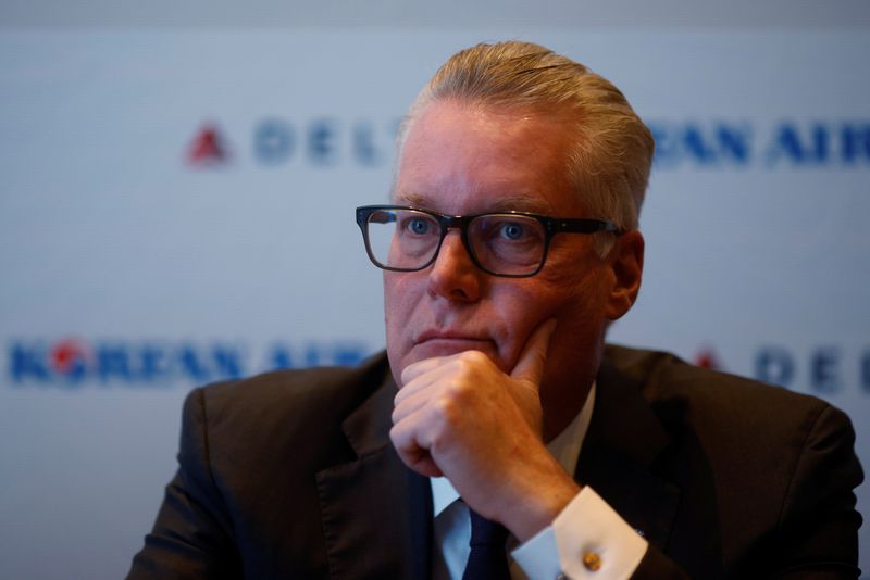 &copy; Reuters. FILE PHOTO: Ed Bastian, CEO of Delta Airlines, answers questions from reporters at the International Air Transport Association’s Annual General Meeting in Boston, Massachusetts, U.S., October 3, 2021.   REUTERS/Brian Snyder/File Photo