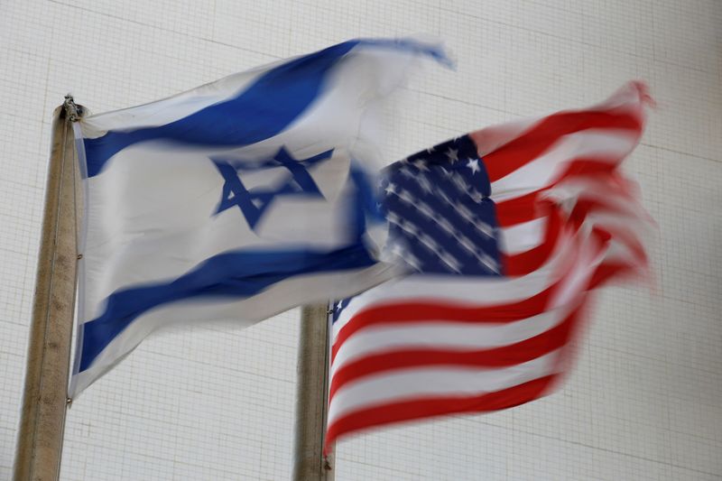 &copy; Reuters. FILE PHOTO: The American and the Israeli national flags can be seen outside the U.S Embassy in Tel Aviv, Israel December 5, 2017. REUTERS/Amir Cohen/File Photo