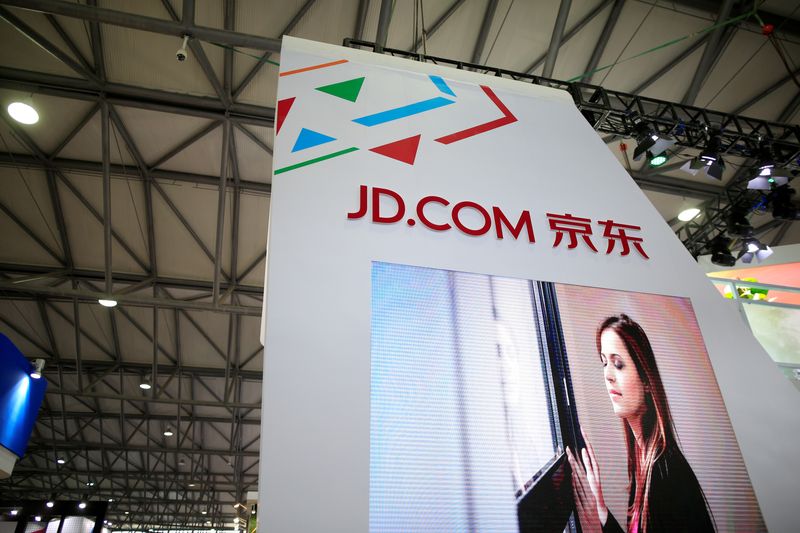 &copy; Reuters. FILE PHOTO: A sign of China's e-commerce company JD.com is seen at CES (Consumer Electronics Show) Asia 2016 in Shanghai, China, May 12, 2016. REUTERS/Aly Song/File Photo                  