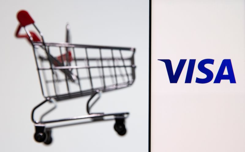 &copy; Reuters. FILE PHOTO: Smartphone with Visa logo is placed near toy shopping cart in this illustration taken, July 15, 2021. REUTERS/Dado Ruvic/Illustration