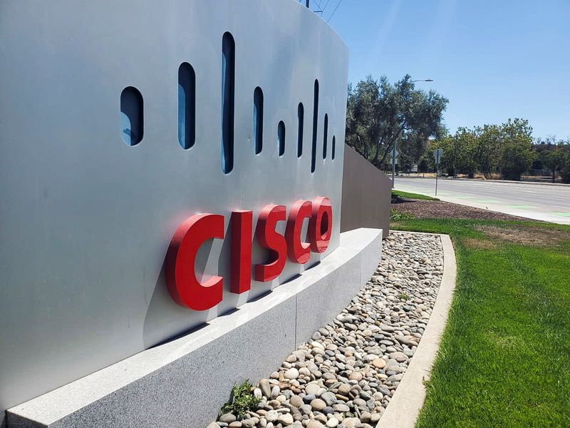 &copy; Reuters. FILE PHOTO: A sign bearing the logo for communications and security tech giant Cisco Systems Inc is seen outside one of its offices in San Jose, California, U.S. August 11, 2022. REUTERS/Paresh Dave/File photo