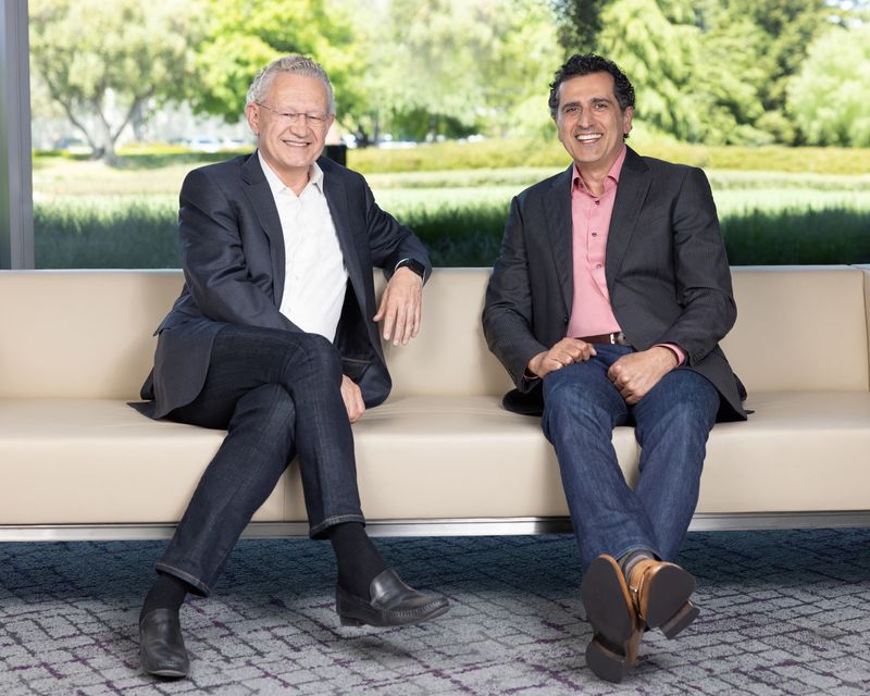 © Reuters. Synopsys outgoing CEO Aart de Geus poses with incoming CEO Sassine Ghazi in an undated photograph obtained by Reuters on August 16, 2023.  Synopsys/Handout via REUTERS. 