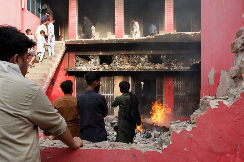 Troops guard Pakistani Christians after mob torches churches