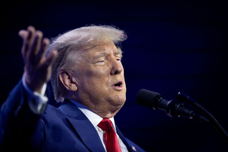 &copy; Reuters. FILE PHOTO: Former U.S. President and Republican presidential candidate Donald Trump gestures as he speaks during the Turning Point Action Conference in West Palm Beach, Florida, U.S. July 15, 2023. REUTERS/Marco Bello/File Photo