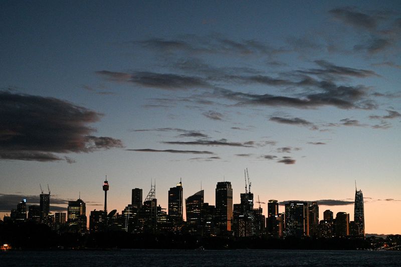 &copy; Reuters. FILE PHOTO: The Sydney city centre skyline is seen as the state of New South Wales continues to report low numbers for new daily cases of the coronavirus disease (COVID-19) in Sydney, Australia, August 16, 2020. REUTERS/Loren Elliott/File Photo