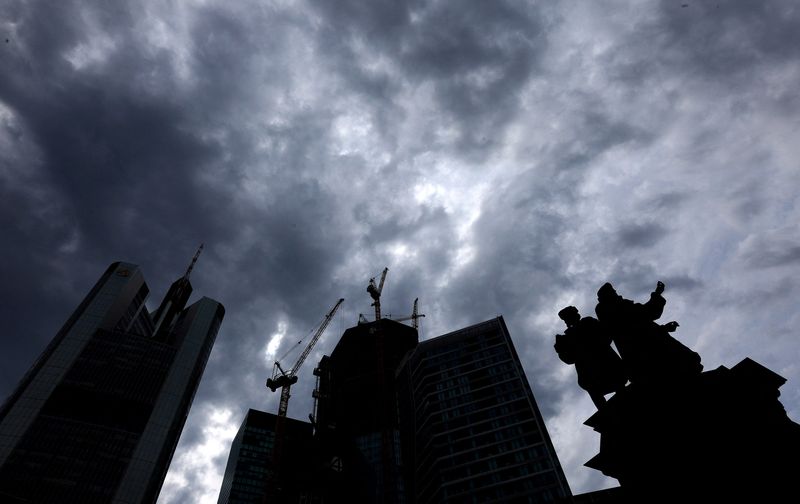 &copy; Reuters. FILE PHOTO: Dark clouds are seen over the construction site of "4 Frankfurt" skyscraper next to the statue of German inventor Johannes Gutenberg and Commerzbank tower in Frankfurt, Germany, July 19, 2023. Germany's property sector is in stress, underscori