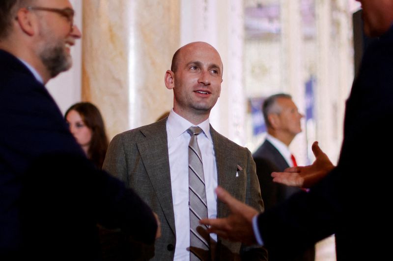 &copy; Reuters. FILE PHOTO: Trump administration senior advisor Stephen Miller speaks with fellow supporters as they gather in the ballroom at former U.S. President Donald Trump's Mar-a-Lago estate in Palm Beach, Florida, U.S. November 15, 2022.  REUTERS/Jonathan Ernst