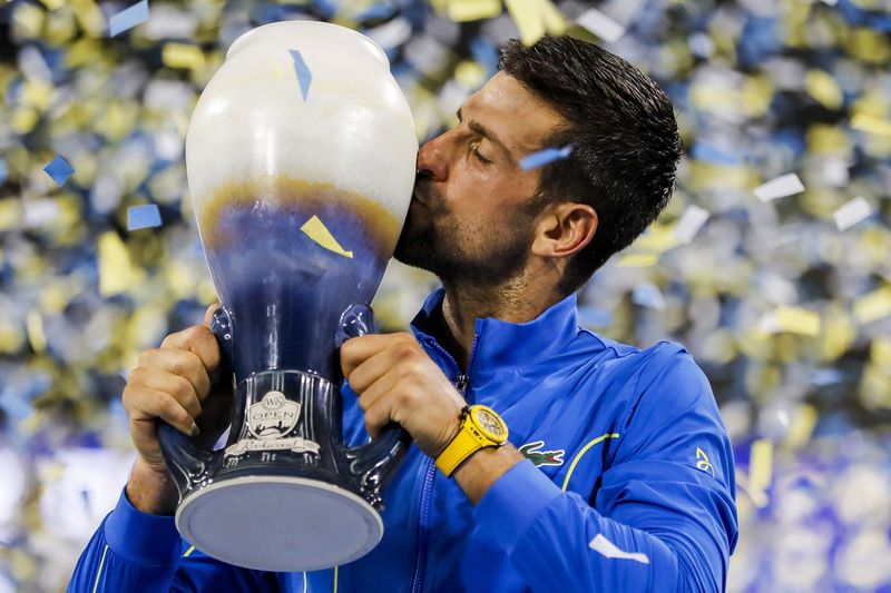&copy; Reuters. Aug 20, 2023; Mason, OH, USA; Novak Djokovic (SRB) kisses the Rookwood Cup after the victory over Carlos Alcaraz (ESP) during the menÕs singles final of the Western and Southern Open tennis tournament at Lindner Family Tennis Center. Mandatory Credit: Ka