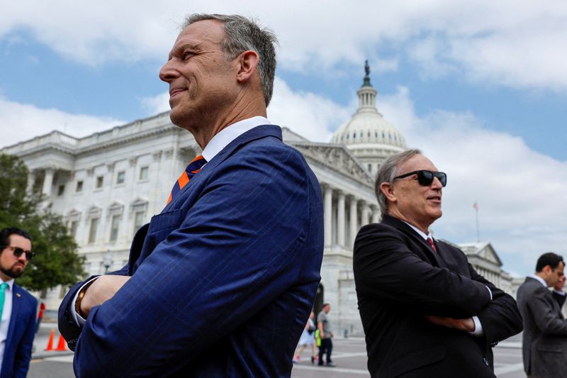 &copy; Reuters. House Freedom Caucus Chairman U.S. Representative Scott Perry (R-PA) and Rep. Andy Biggs (R-AZ) wait for the start of a press conference at the U.S. Capitol in Washington, U.S. May 30, 2023.  REUTERS/Jonathan Ernst/File Photo