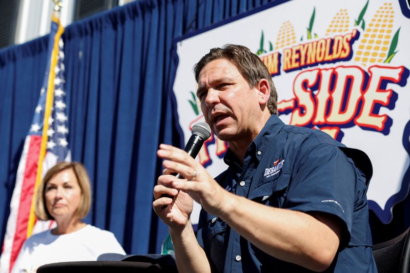 &copy; Reuters. FILE PHOTO: Republican presidential candidate Ron DeSantis speaks next to Iowa Governor Kim Reynolds during a "Fair-Side Chat" hosted by the governor at the Iowa State Fair in Des Moines, Iowa, U.S., August 12, 2023.  REUTERS/Evelyn Hockstein/File Photo