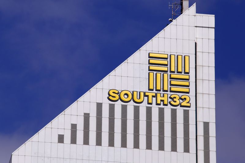 &copy; Reuters. FILE PHOTO: A sign adorns the building where Australian miner South32 has their office in Perth, Western Australia, November 19, 2015.   REUTERS/David Gray/File Photo