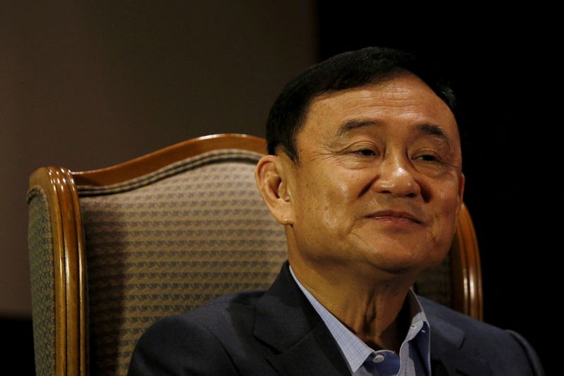 Plane carrying Thailand's exiled ex-PM Thaksin lands in Bangkok - media, live TV