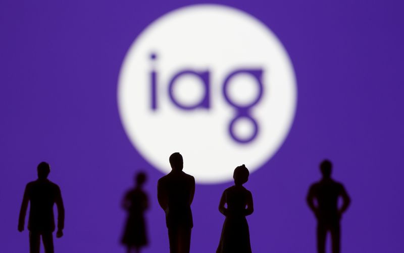 &copy; Reuters. Small toy figures are seen in front of displayed IAG (Insurance Australia Group) logo in this illustration taken, November 8, 2021. REUTERS/Dado Ruvic/Illustration/file photo