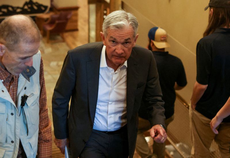 &copy; Reuters. Federal Reserve Chair Jerome Powell walks in Teton National Park where financial leaders from around the world gathered for the Jackson Hole economic symposium outside Jackson, Wyoming, U.S., August 26, 2022. REUTERS/Jim Urquhart