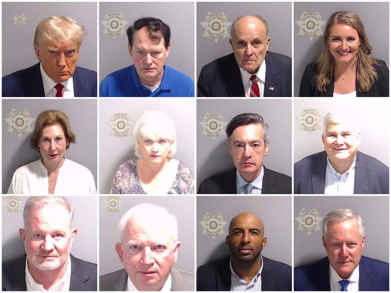 &copy; Reuters. A combination picture shows police booking mugshots of former U.S. President Donald Trump and 11 of the 18 people indicted with him, including Ray Smith, a lawyer who previously represented Trump in Georgia, Rudy Giuliani, who served as Trump's personal l