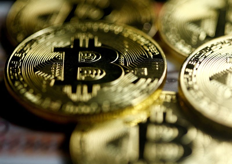 &copy; Reuters. FILE PHOTO: Bitcoins are seen in this illustration picture taken September 27, 2017. REUTERS/Dado Ruvic/Illustration/File Photo