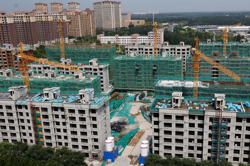 &copy; Reuters. FOTO DE ARCHIVO: Vista general de una obra de construcción de edificios residenciales del promotor chino Country Garden en Tianjin, China. 18 de agosto, 2023. REUTERS/Tingshu Wang