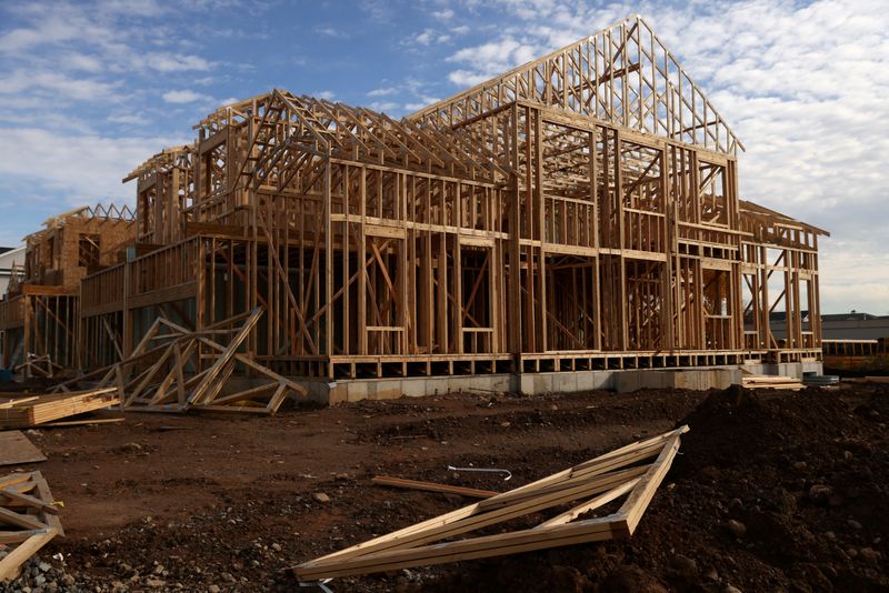 &copy; Reuters. FILE PHOTO: The structural frame of a house is seen at The Collection at Morristown, a housing development by Lennar Corporation, in Morristown, New Jersey, U.S., November 13, 2021. REUTERS/Andrew Kelly/File Photo