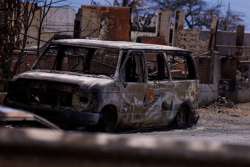 &copy; Reuters. FILE PHOTO: A damaged vehicle is pictured in the fire ravaged town of Lahaina on the island of Maui in Hawaii, U.S., August 15, 2023.  REUTERS/Mike Blake/File Photo