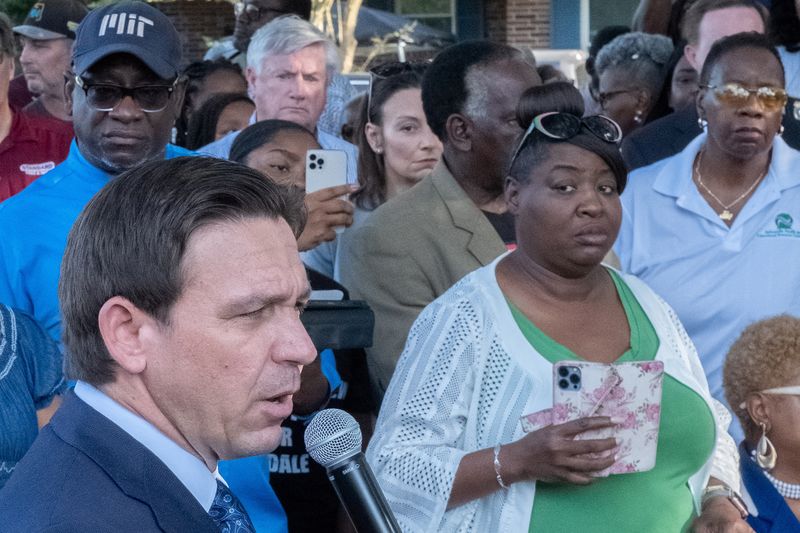 &copy; Reuters. Florida Governor Ron DeSantis speaks at a prayer vigil, a day after a white man armed with a high-powered rifle and a handgun killed three Black people at a Dollar General store before shooting himself in what local law enforcement described as a racially