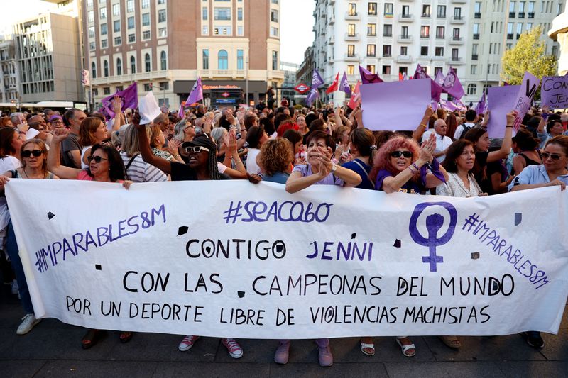 &copy; Reuters. Soccer Football - People protest against Royal Spanish Football Federation President Luis Rubiales - Plaza Callao, Madrid, Spain - August 28, 2023 People hold banners and protest in Madrid following a kiss between Royal Spanish Football Federation Preside