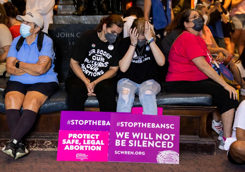 &copy; Reuters. FILE PHOTO: Protesters react as they gather inside the South Carolina House as members debate a new near-total ban on abortion with no exceptions for pregnancies caused by rape or incest at the state legislature in Columbia, South Carolina, U.S. August 30