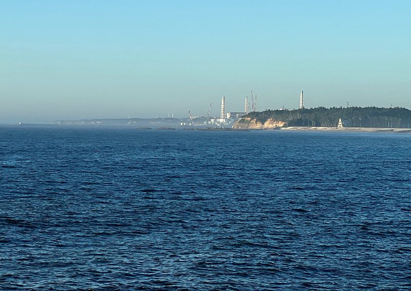 &copy; Reuters. FILE PHOTO: A view of the Fukushima Daiichi nuclear power plant after it started releasing treated radioactive water into the Pacific Ocean, seen from the nearby Ukedo fishing port in Namie town, Fukushima Prefecture, Japan, Aug. 25, 2023. REUTERS/Tom Bat