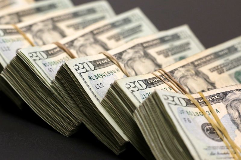 &copy; Reuters. FILE PHOTO: Bundles of banknotes of U.S. Dollar are pictured at a currency exchange shop in Ciudad Juarez, Mexico January 15, 2018. REUTERS/Jose Luis Gonzalez