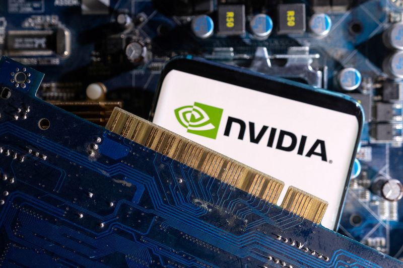 © Reuters. A smartphone with a displayed NVIDIA logo is placed on a computer motherboard in this illustration taken March 6, 2023. REUTERS/Dado Ruvic/Illustration