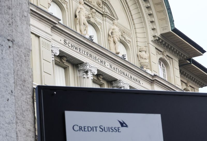 &copy; Reuters. The logo of Credit Suisse is pictured infront of the Swiss National Bank, in Bern, Switzerland, March 19, 2023. REUTERS/Denis Balibouse/File photo