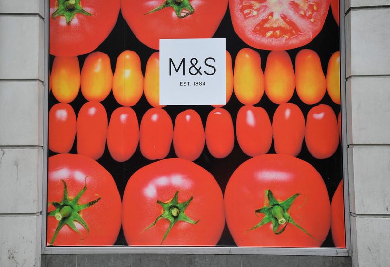 &copy; Reuters. FILE PHOTO: A Marks and Spencer logo is seen on a store in London, Britain, May 23, 2018. REUTERS/Toby Melville/File Photo