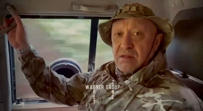 &copy; Reuters. Yevgeny Prigozhin, chief of Russian private mercenary group Wagner, gives an address in camouflage inside a vehicle at an unknown location, in this still image taken from video possibly shot in Africa and published August 31, 2023. Courtesy Grey Zone via 