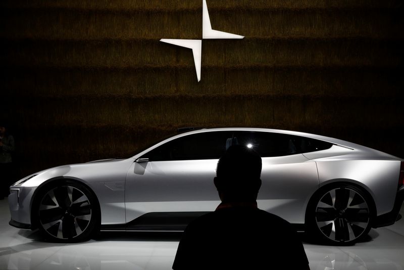 &copy; Reuters. FILE PHOTO: A man looks at a Polestar Precept car at the Beijing International Automotive Exhibition, or Auto China show, in Beijing, China September 26, 2020. REUTERS/Thomas Peter