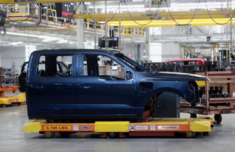 &copy; Reuters. FILE PHOTO: A cab of a model of the all-new F-150 Lightning electric pickup truck is seen on an assembly line at the Ford Rouge Electric Vehicle Center in Dearborn, Michigan, U.S., April 26, 2022. REUTERS/Rebecca Cook/File Photo
