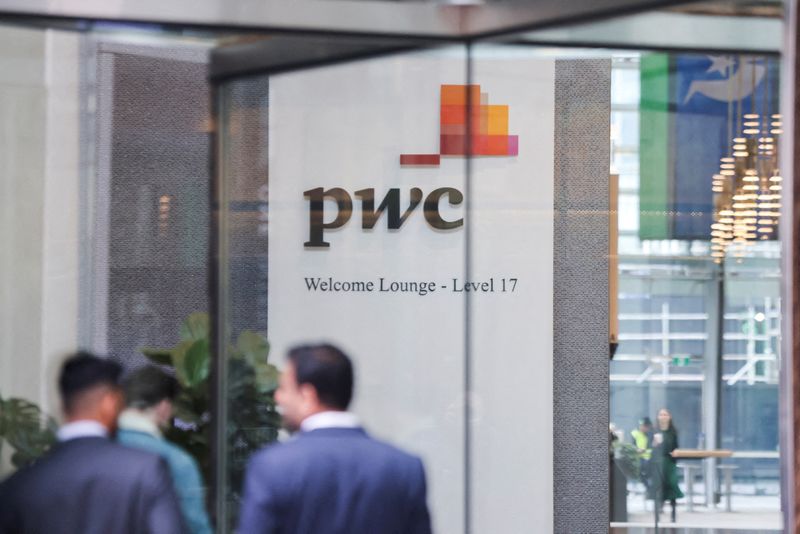 &copy; Reuters. FILE PHOTO: PwC sign is seen in the lobby of their offices in Barangaroo, Australia June 22, 2023. REUTERS/Lewis Jackson/File Photo/File Photo