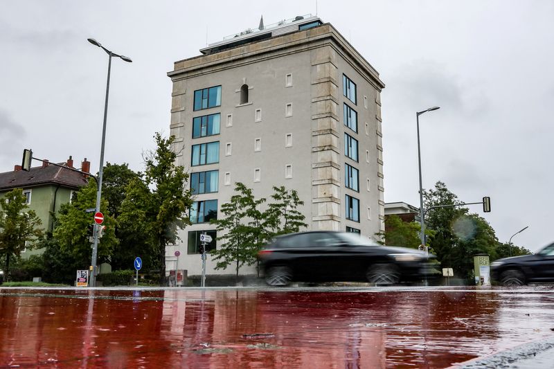 © Reuters. Cars drive on a rain-soaked road past an air raid shelter converted into luxury apartments at Ungererstrasse 158 in Munich, Germany,  August 27, 2023. REUTERS/Leonhard Simon
