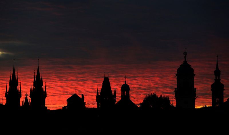 &copy; Reuters. FILE PHOTO: A sun rises behind the Prague skyline, Czech Republic, September 3, 2020.    REUTERS/David W Cerny