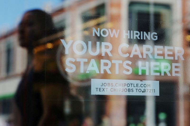 &copy; Reuters. FILE PHOTO: A Chipotle restaurant advertises it is hiring in Cambridge, Massachusetts, U.S., August 28, 2023. REUTERS/Brian Snyder/File Photo