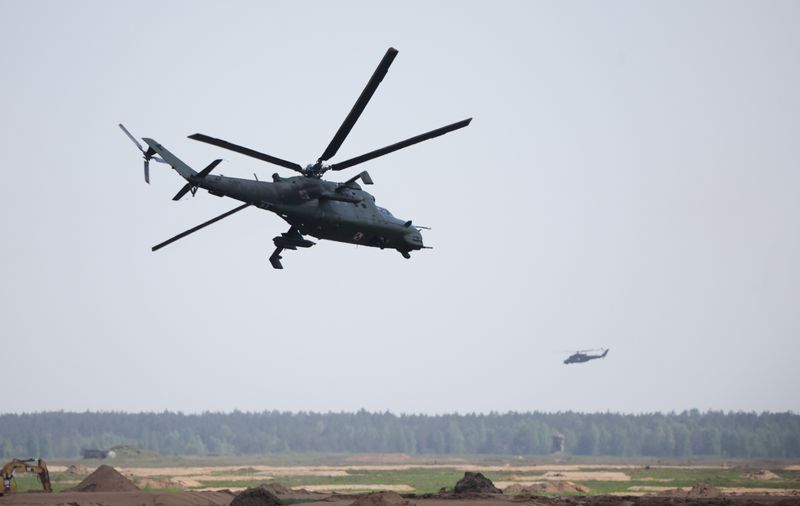 &copy; Reuters. FILE PHOTO: Polish Mi-24 helicopters flight during Defender Europe 2022 military exercise of NATO troops including French, American, and Polish troops, amid the Russian invasion of Ukraine, at the military range in Bemowo Piskie, near Orzysz, Poland May 2