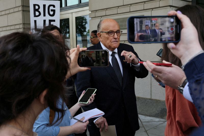 &copy; Reuters. FILE PHOTO: Former New York City Mayor Rudy Giuliani, an attorney for former President Donald Trump during challenges to the 2020 election results, exits U.S. District Court after attending a hearing in a defamation suit related to the 2020 U.S. president