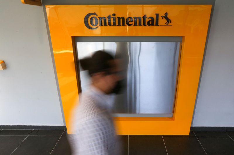 &copy; Reuters. FILE PHOTO: A man walks by the logo of German company Continental, one of the world's largest automotive suppliers, at its new plant in Aguascalientes, Mexico March 4, 2021. Picture taken March 4, 2021. REUTERS/Fernando Carranza/file photo