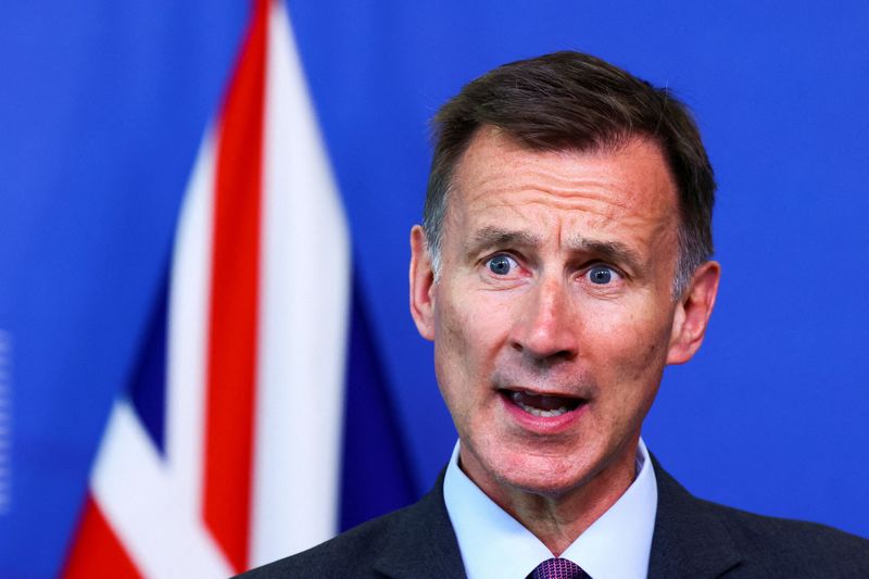 &copy; Reuters. FILE PHOTO: British Chancellor of the Exchequer Jeremy Hunt speaks during the press conference on the day he signs cooperation pact on financial services with European Commissioner for Financial Stability, Financial Services and the Capital Markets Union 
