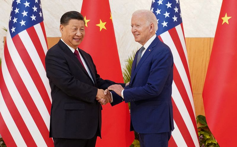 &copy; Reuters. FILE PHOTO: U.S. President Joe Biden shakes hands with Chinese President Xi Jinping as they meet on the sidelines of the G20 leaders' summit in Bali, Indonesia, November 14, 2022.  REUTERS/Kevin Lamarque/File Photo