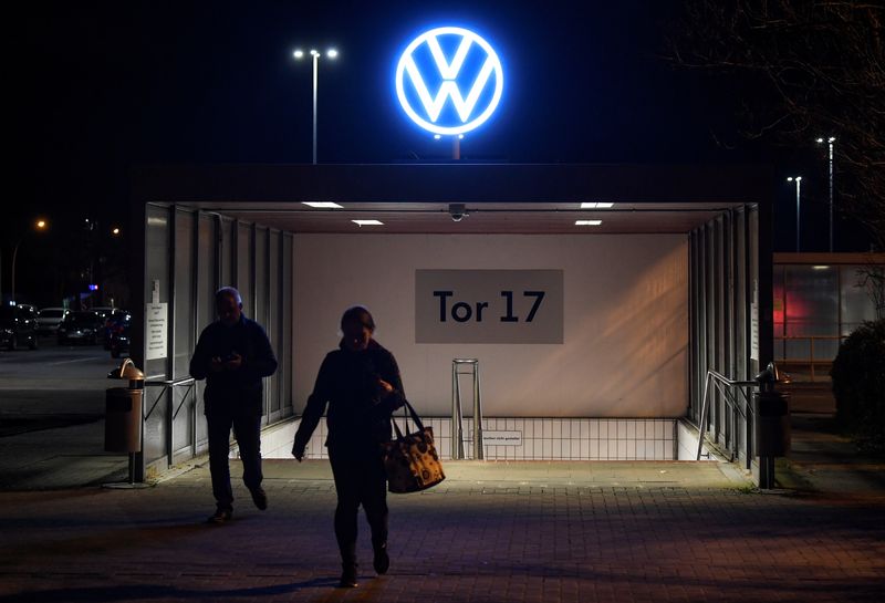 &copy; Reuters. Employees leave the Volkswagen (VW) plant after VW starts shutting down production in Europe amid the outbreak of coronavirus disease (COVID-19) in Wolfsburg, Germany, late March 19, 2020. REUTERS/Fabian Bimmer/File photo